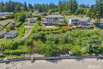 Storage shed on bulkhead for your water toys. Kayak and paddle board off your beach.
