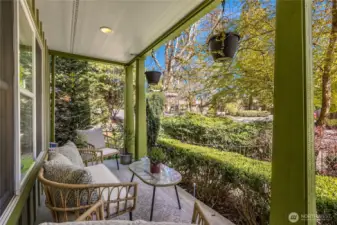 Covered front porch to enjoy all year-round.  You also get front-row seats to watch the 4th of July parade.