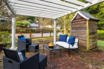 The gazebo and patio create a charming spot for relaxing.
