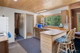 Nice sized kitchen with butcher block counters includes space to