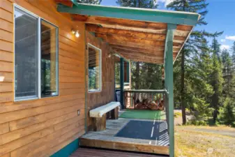 Covered deck to house, much needed for this recreational area. Less shoveling, great for taking off snowy or wet boots.