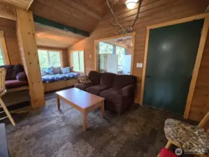 Don't miss the vaulted ceiling with t&g wood off the entry, very pretty.
