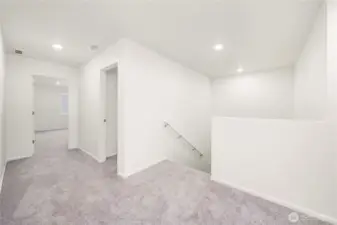 Landing at top of stairs to 2nd floor