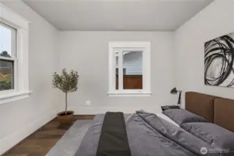 Virtually staged main floor bedroom.