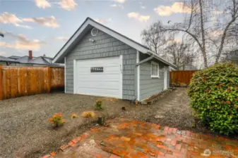 One-car detached garage actually fits most cars...or it can be a great workshop.