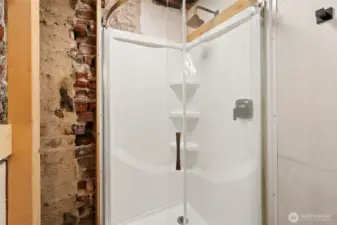 3/4 bath in unique designed bathroom