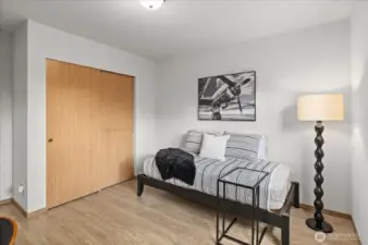 Laminate flooring in bedrooms.