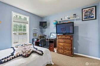 Spacious bedroom 2 - 9' ceilings throughout and located down a private corridor w/full bath along the way.