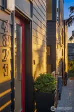 Lovely touches throughout including these metal red house numbers, so fun!
