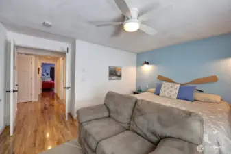 Primary bedroom with walk in closet and sitting area