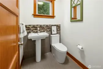 Main level Powder room off of kitchen