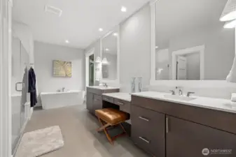 Primary bathroom enjoys a window over your private greenbelt views.