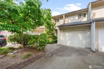Single car garage with parking in front of garage for additional vehicles. Plus additional guest parking across the street.