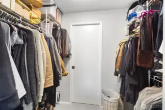 Primary walk-in closet.