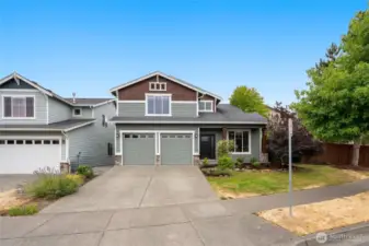 This charming 4-bedroom, 2.5-bath home offers 2,200 sq ft of easy-care living with an open floor plan and large windows that flood the space with natural light.