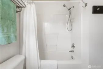 Upstairs hall bathroom with bathtub.