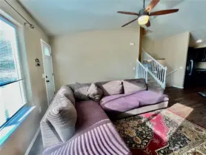 laminate floors and large window to bring in natural light