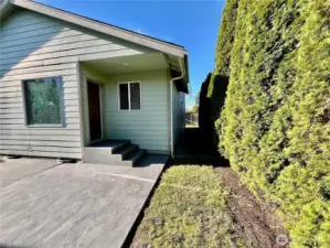 cement deck from house to side yard