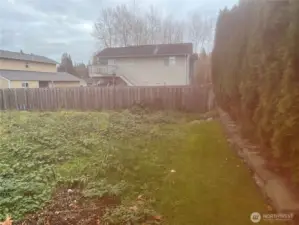 Backyard is behind vacant lot