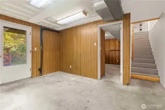 Downstairs area with door to the back yard