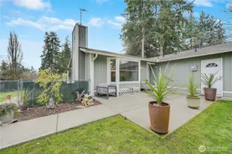 The beautiful front patio is one of three great outdoor spaces.