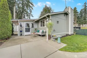 The rear patio is the second of three outdoor spaces, wait until you see the hot tub courtyard patio, you will love it.