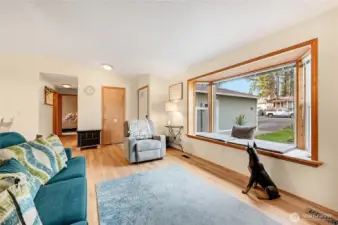 Entering the home you will be greeted by this wonderful living room with big bay window.