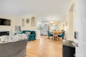The living room flows nicely into the dining room.