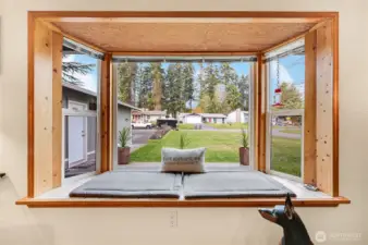 The bay window with sitting area, nice and bright.