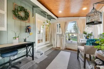 Another view of the enclosed patio that accesses the second patio and fenced in yard.