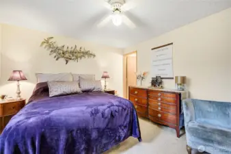 The spacious primary, the door on the right goes to private half bathroom.