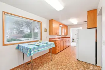 Eating Space in kitchen. Add a table or hightop with stools.