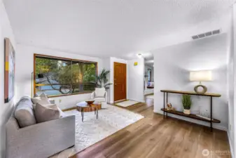 Large southern windows in this light filled living room.