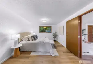 Large primary bedroom and fresh paint throughout the home.