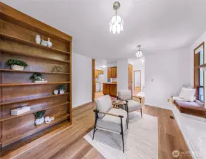 Large built in bookcase gives this room wonderful charm