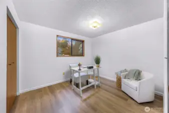 Second bedroom with east facing window.