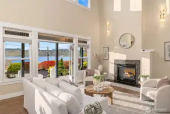 The cozy propane fireplace is double-sided and can be enjoyed from the great room and the primary ensuite.