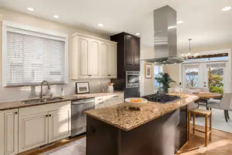The gourmet kitchen features Bosch appliances and a generous walk-in pantry.