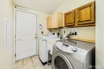 Laundry room with door into the garage