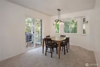 Dining room with slider leading to the deck