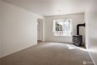 Living room with free standing natural gas fireplace