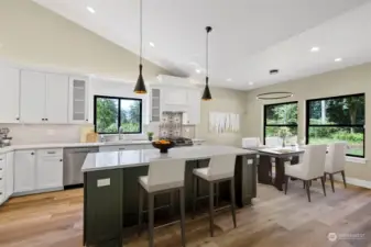 Virtually Staged to show just a little of what your kitchen can really be. Lots of extra cabinetry with a soft close, sparkling quartz counters, stainless appliances, drawer style microwave