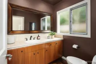 Guest powder room off the foyer.