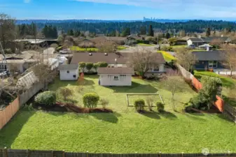 Huge back yard with space for play and garden