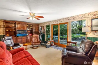 Relax in the family room  while enjoying the views of the back yard.