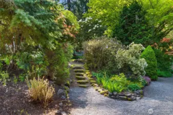 The gorgeously landscaped yard welcomes you home!