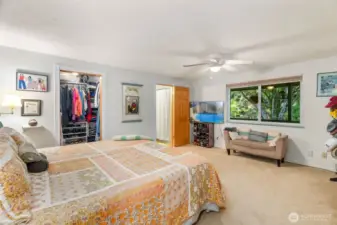 Primary bedroom is huge and features walk-in closet and en-suite bathroom