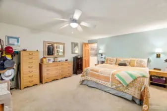 Primary bedroom facing hallway