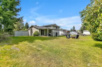 Backyard with level lawn areas