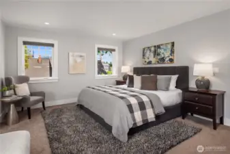The primary easily handles a king sized bed and the largest of bedroom furniture.